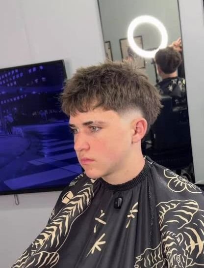 Short Swept-Up Quiff with Burst Fade