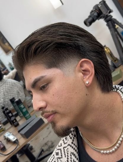 Textured Slicked-Back Cut with Longer Back